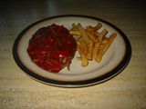 Schweinehalssteaks Zigeuner Art mit Pommes Frites